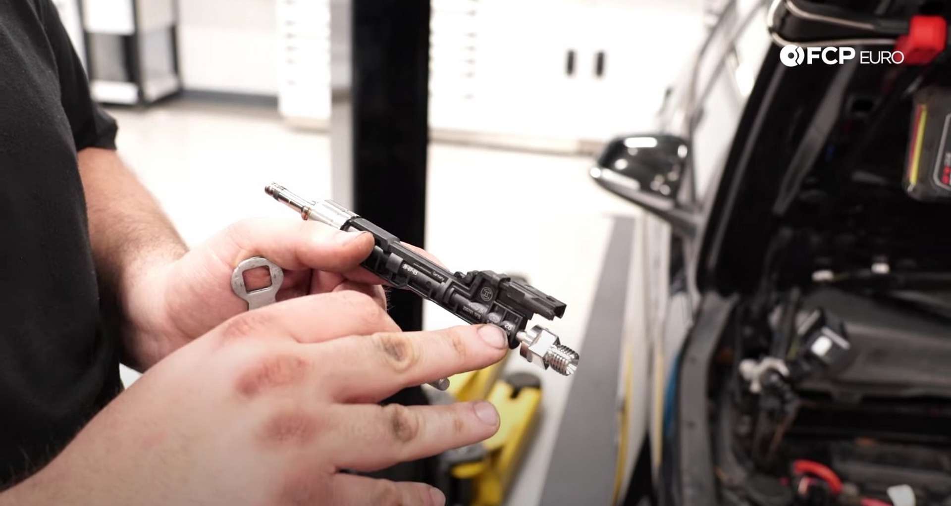 DIY BMW F30 Fuel Injector Replacement removing the injector hold-down bolts