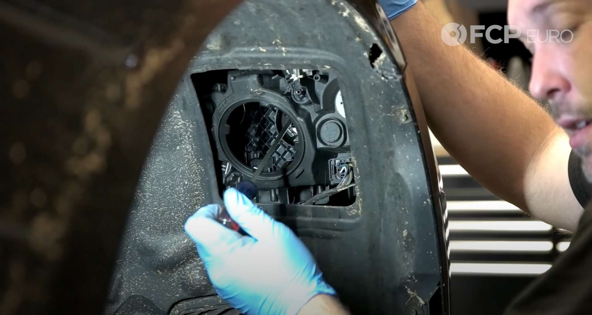 DIY BMW F30 Headlight Bulb Replacement removing the headlight bulb