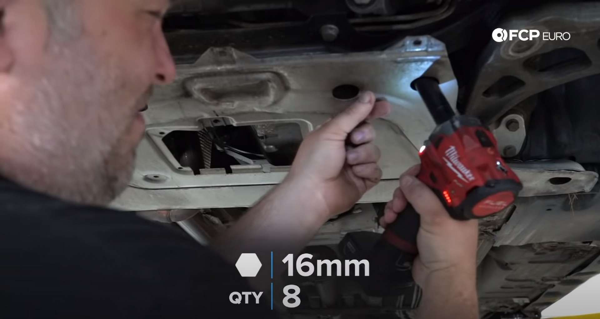 DIY BMW E46 Clutch Replacement removing the subframe reinforcement plate