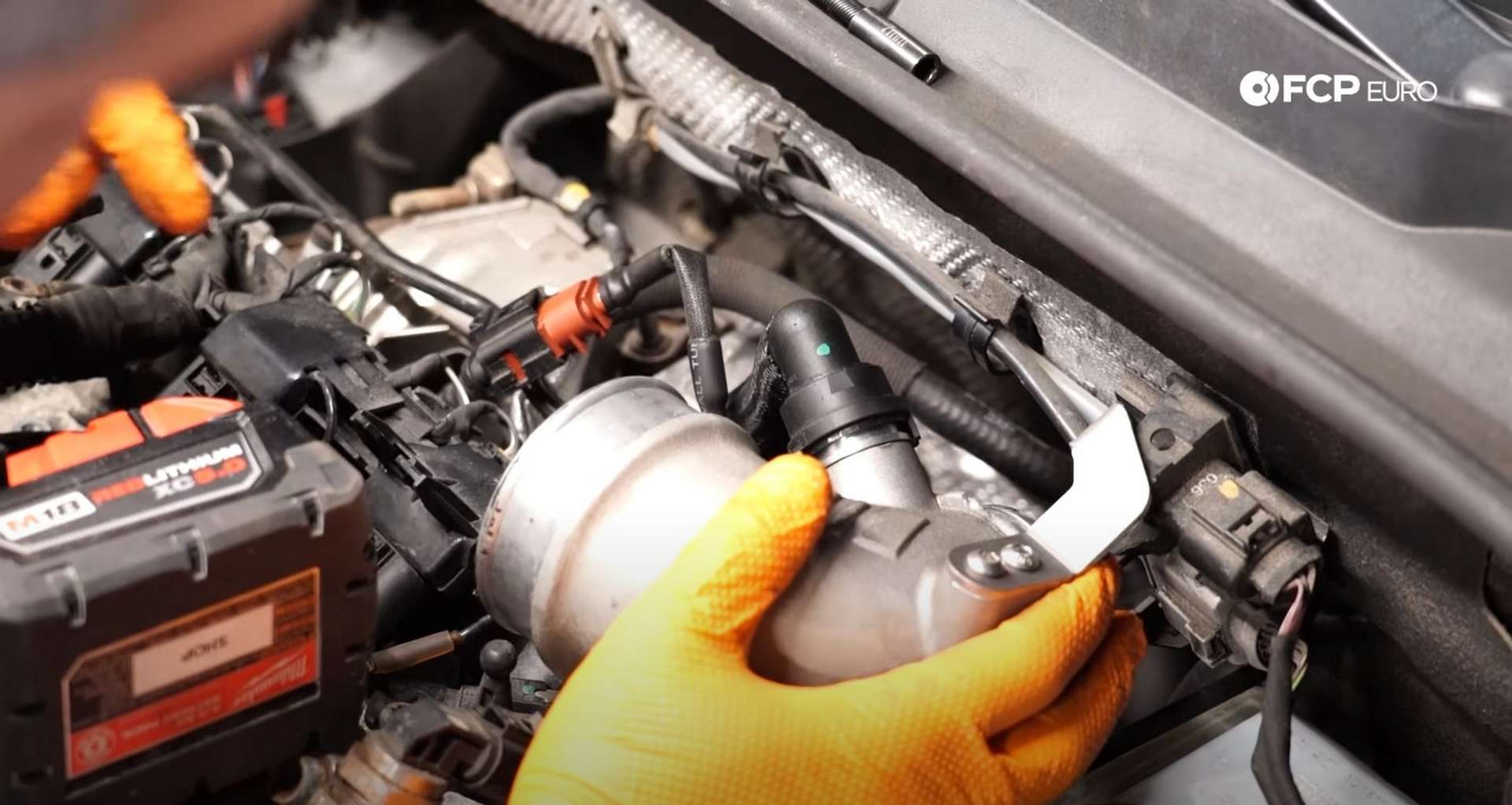 DIY MK7 VW GTI Turbocharger Upgrade identifying the PCV hose connection to the pipe