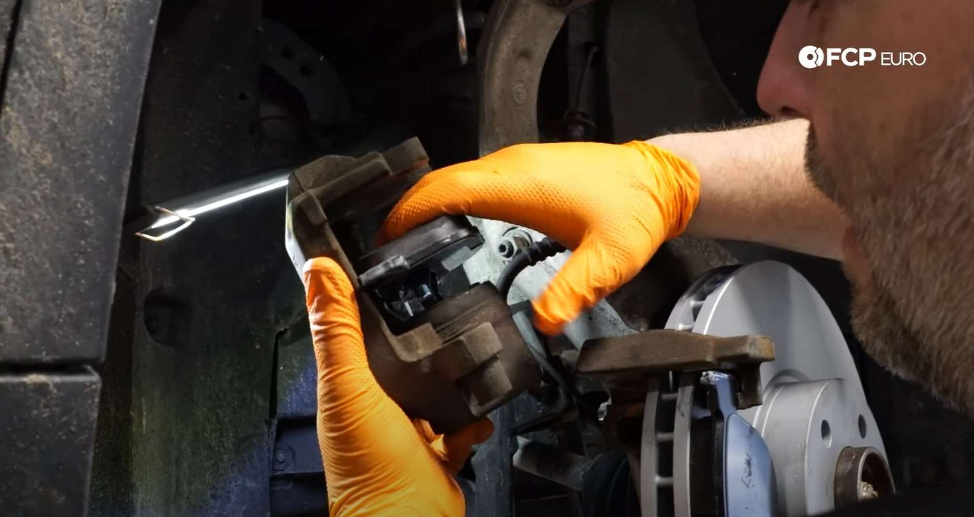 DIY BMW F15 X5 F16 X6 Brake Service installing the inner pad