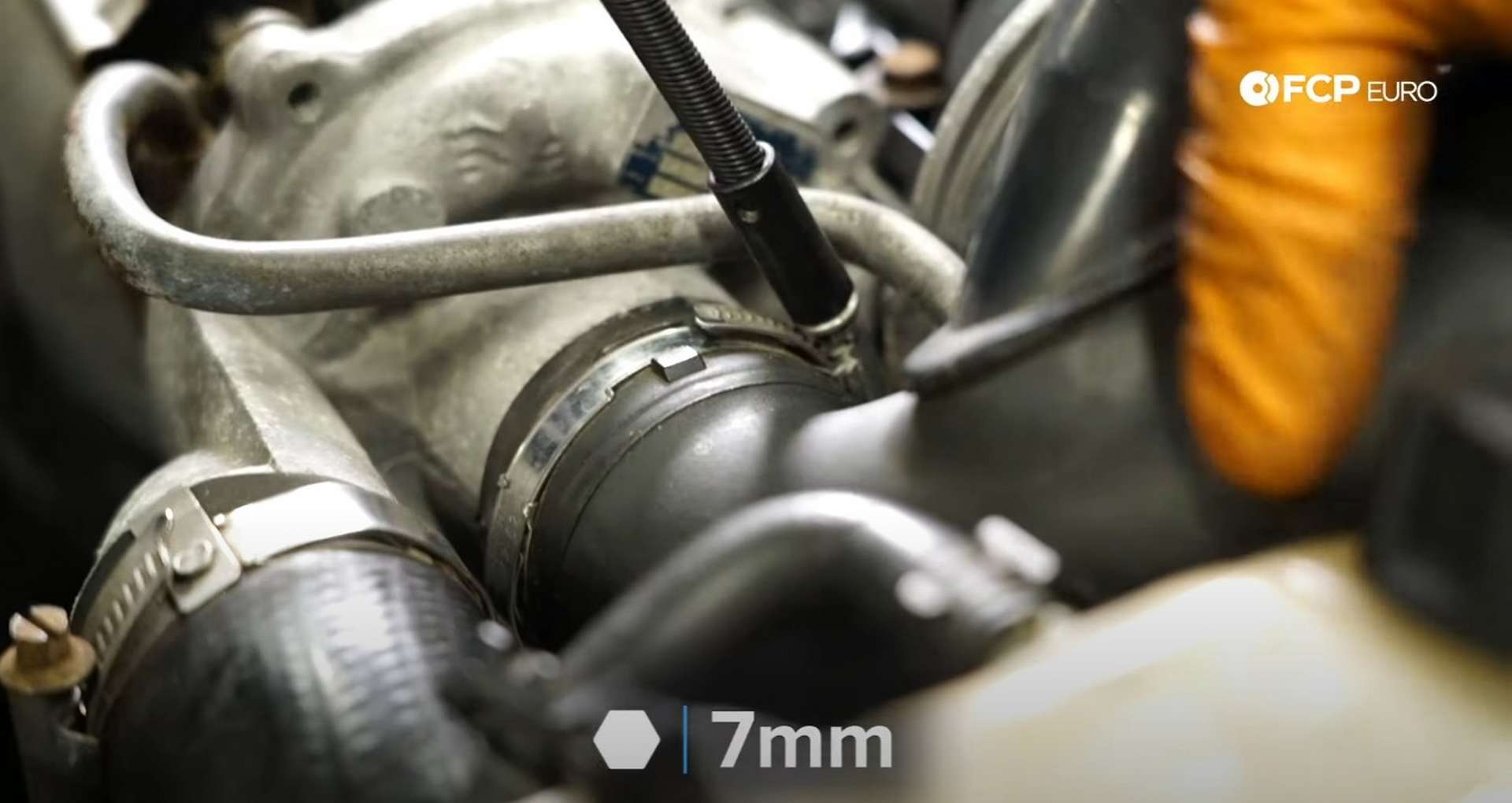 DIY MINI R56 Timing Chain Replacement tightening the turbo inlet hose clamp