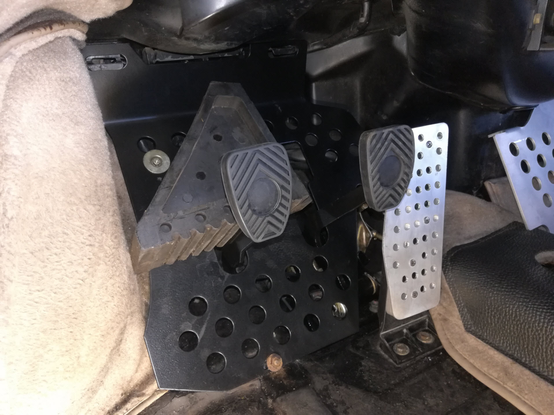 Air-cooled Porsche 911 clutch pedal chock for extra cable slack.