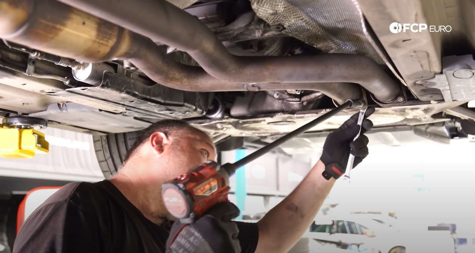 DIY E46 BMW M3 Rear Subframe Refresh Part 3 tightening the exhaust bolts