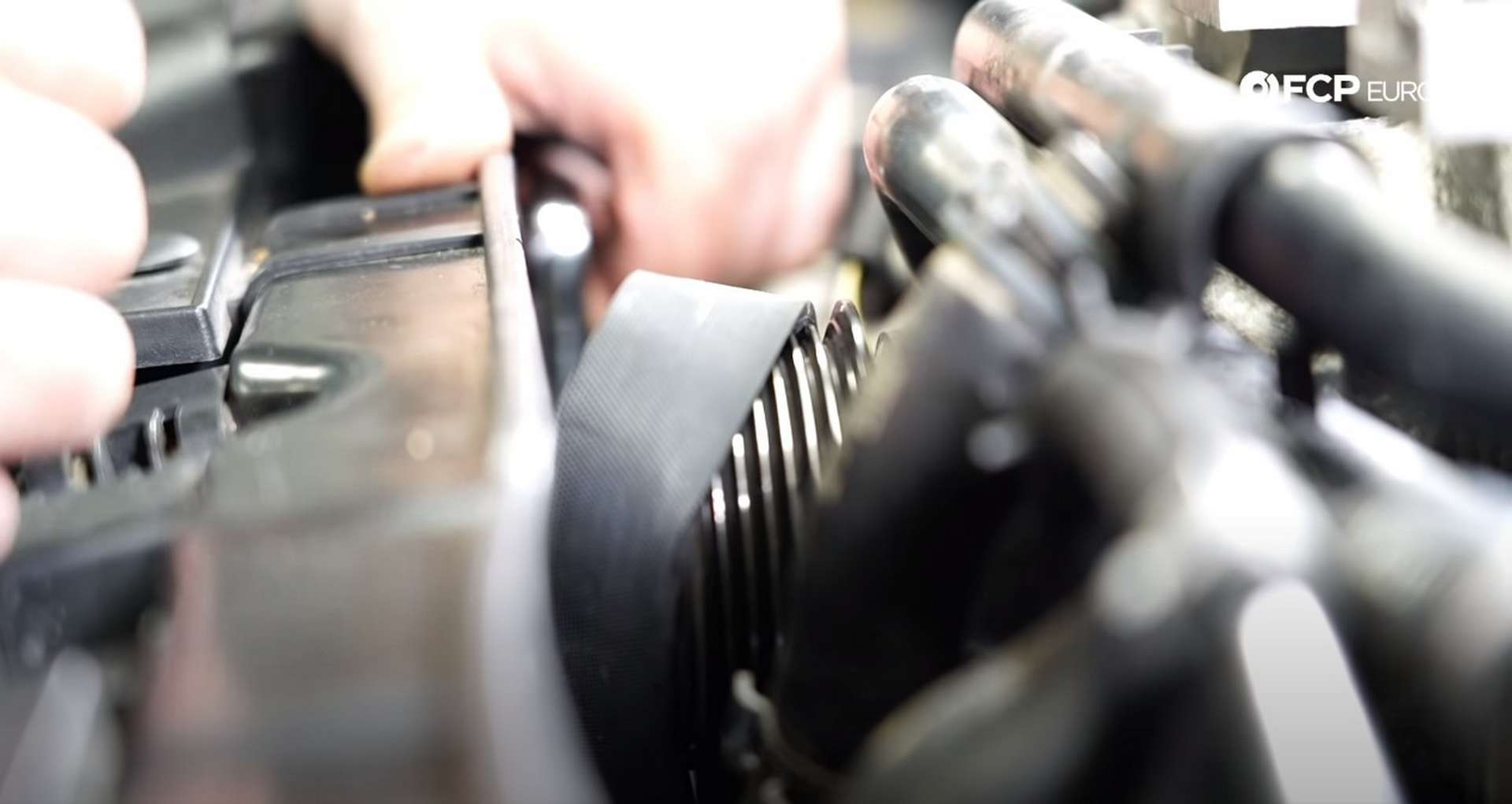 DIY Audi 3.0T Supercharger Oil Change fitting the supercharger belt