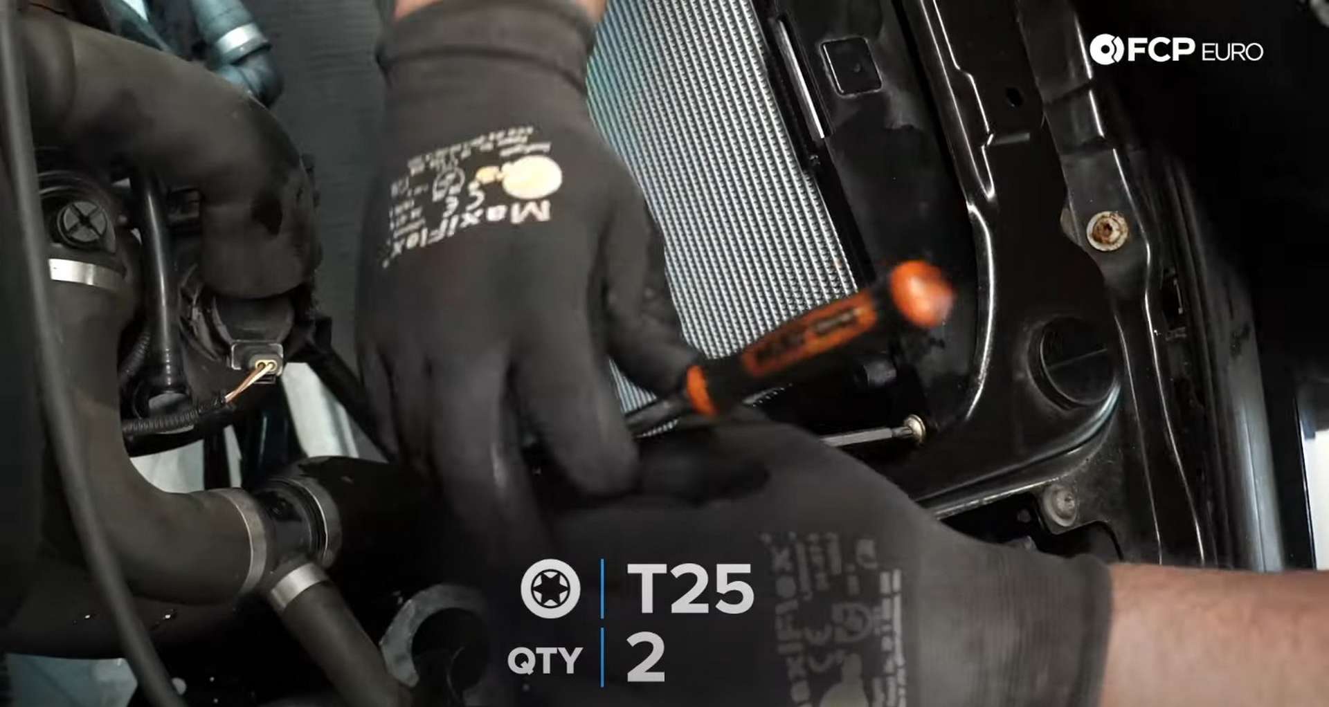 DIY BMW F30 Radiator Replacement installing the radiator mounting plate