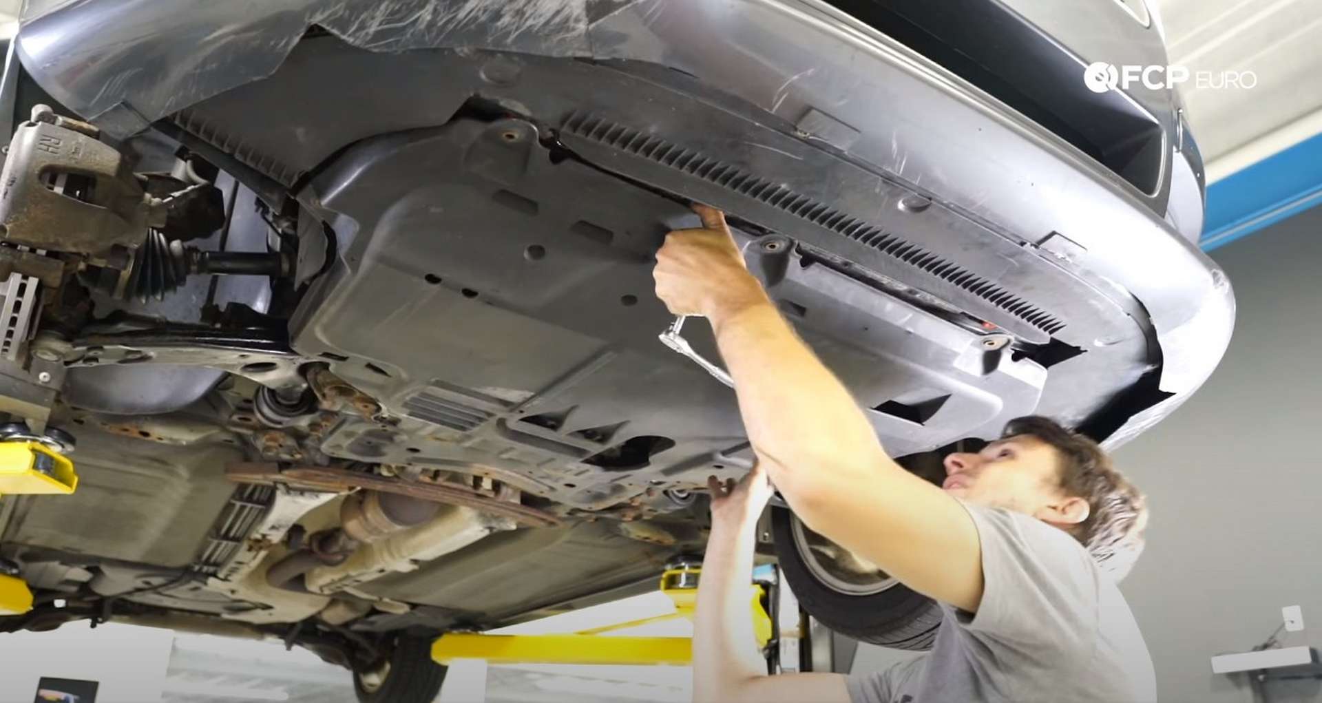 DIY Volvo P1 Timing Belt Replacement installing the splash shield