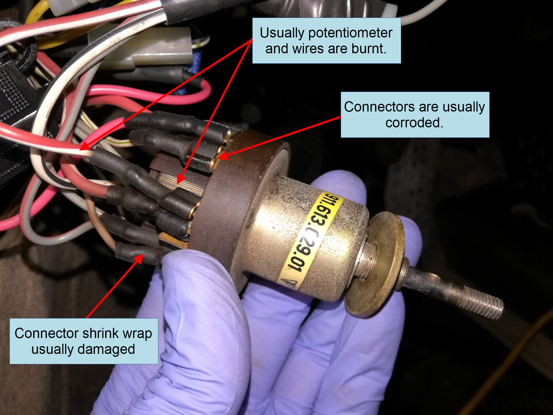 Air-cooled Porsche 911 headlight switch inspection.