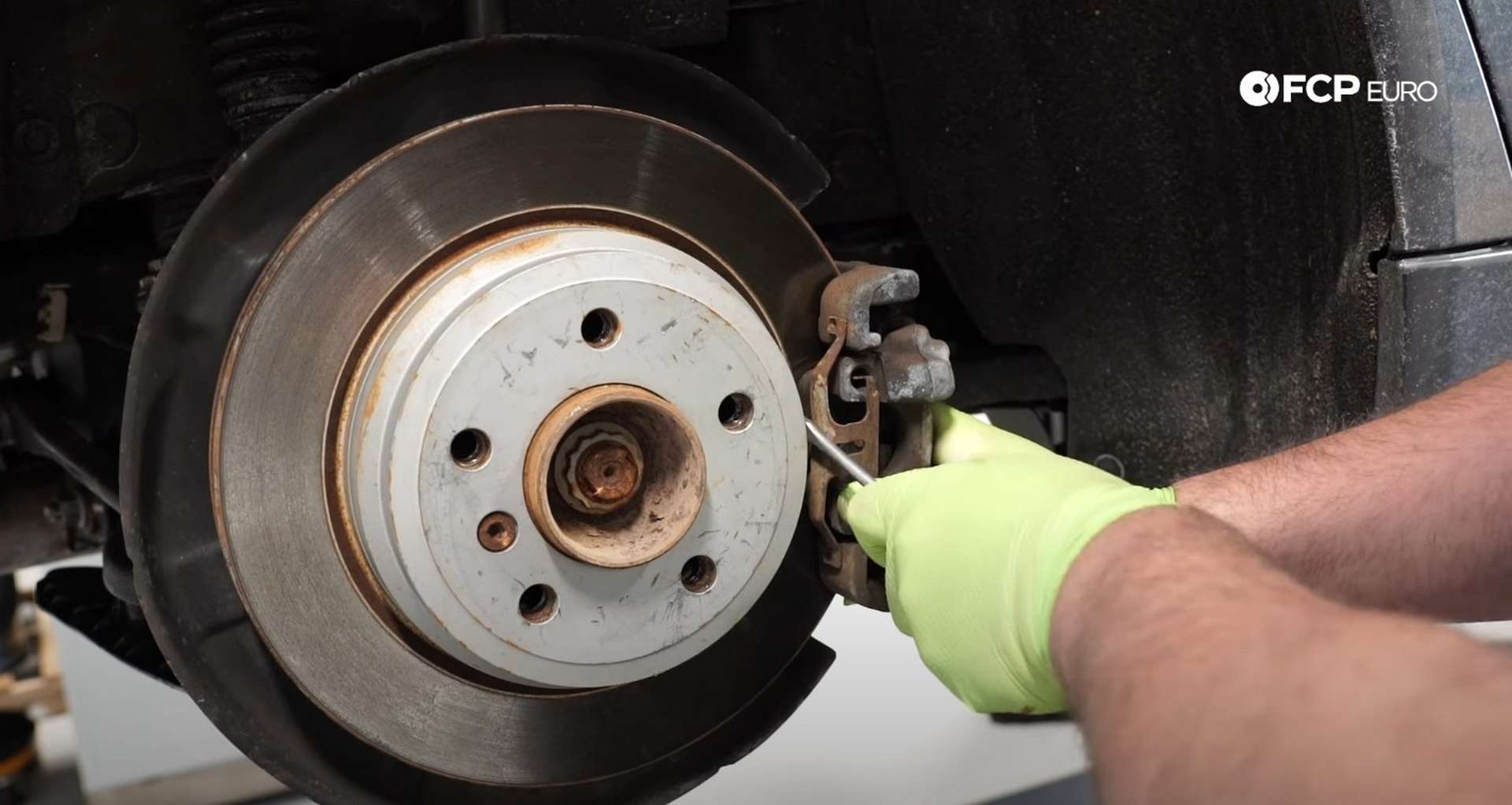 DIY BMW F30 Rear Brake Service removing the calipers anti-rattle clip
