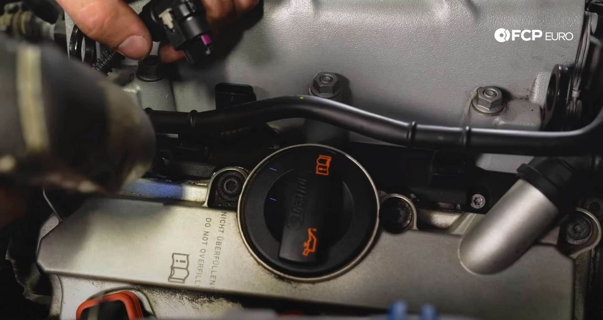 DIY Audi B8.5 Water Pump and Thermostat Replacement removing the map sensor covers