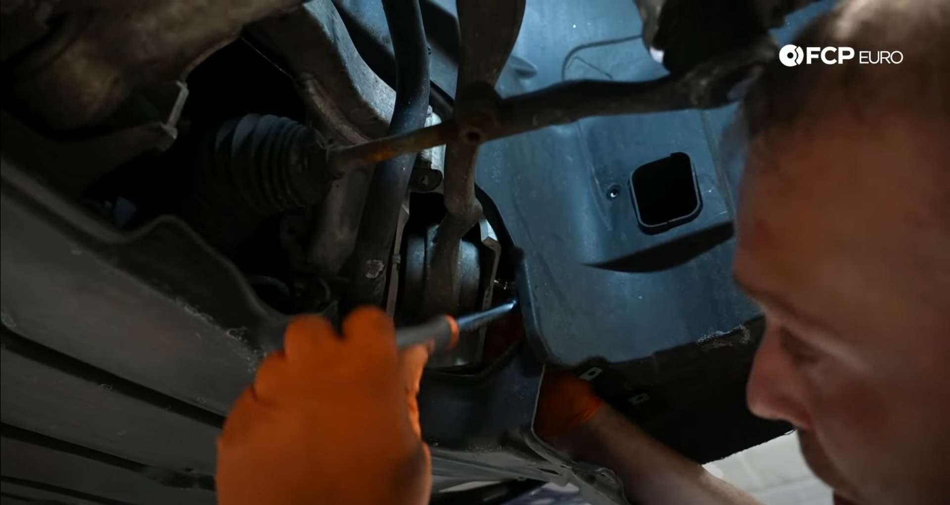 DIY BMW E9X Front Control Arm Upgrade removing the tension rod’s inner mounting bolt