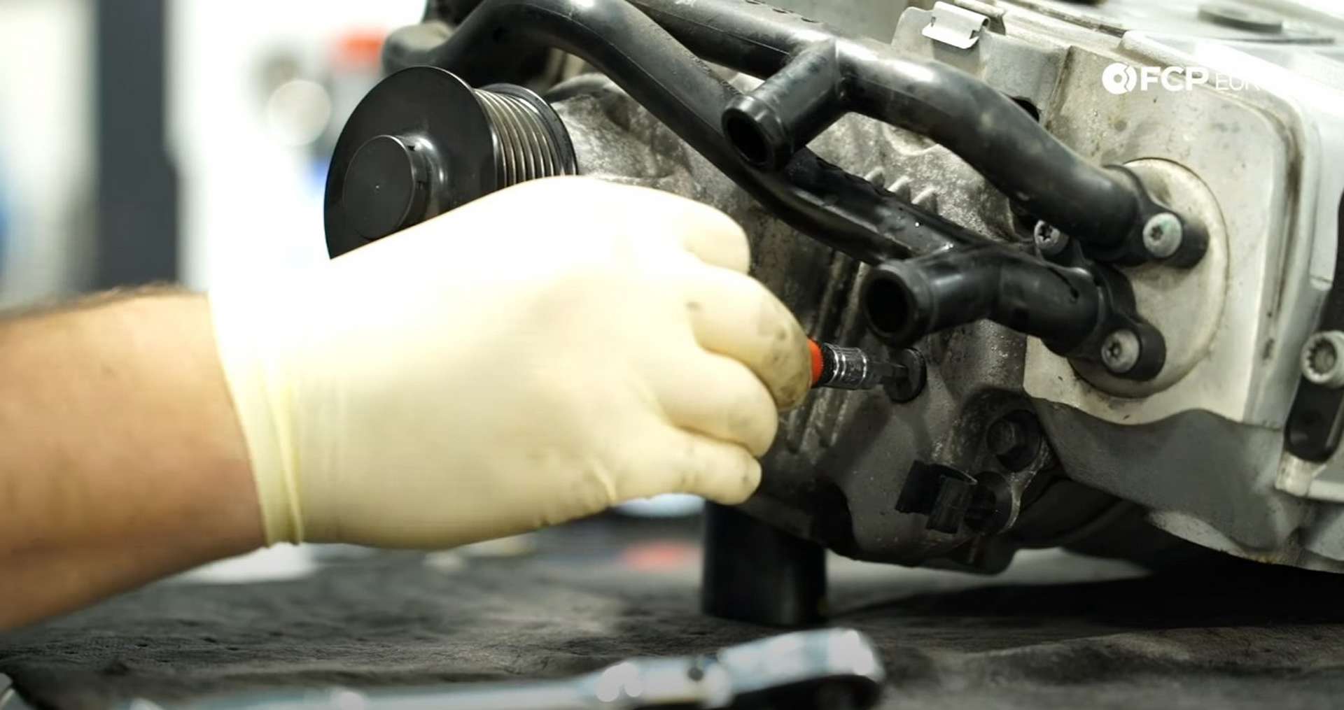 DIY Audi 3.0T Supercharger Oil Change removing the supercharger's fill plug