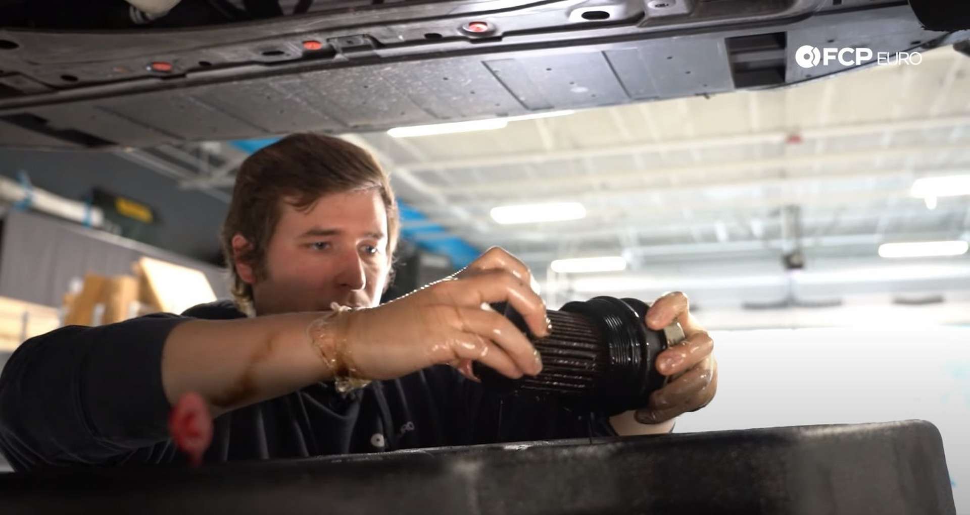 DIY Volvo SPA Oil Change removing the oil filter from the housing’s cap