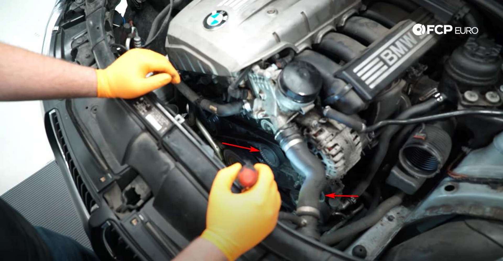 DIY BMW N52 Drive Belt Replacement pulley and tensioner cap locations