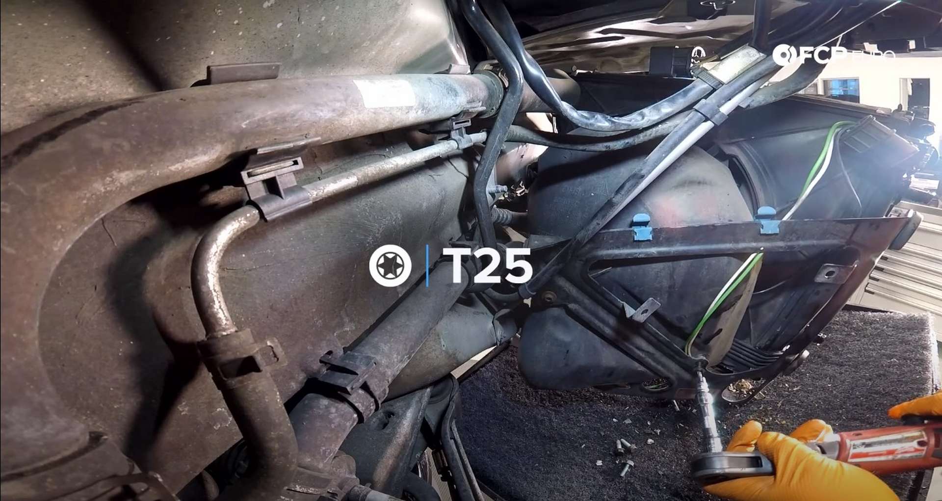 DIY Porsche 996 Radiator Replacement removing outer-lower screw