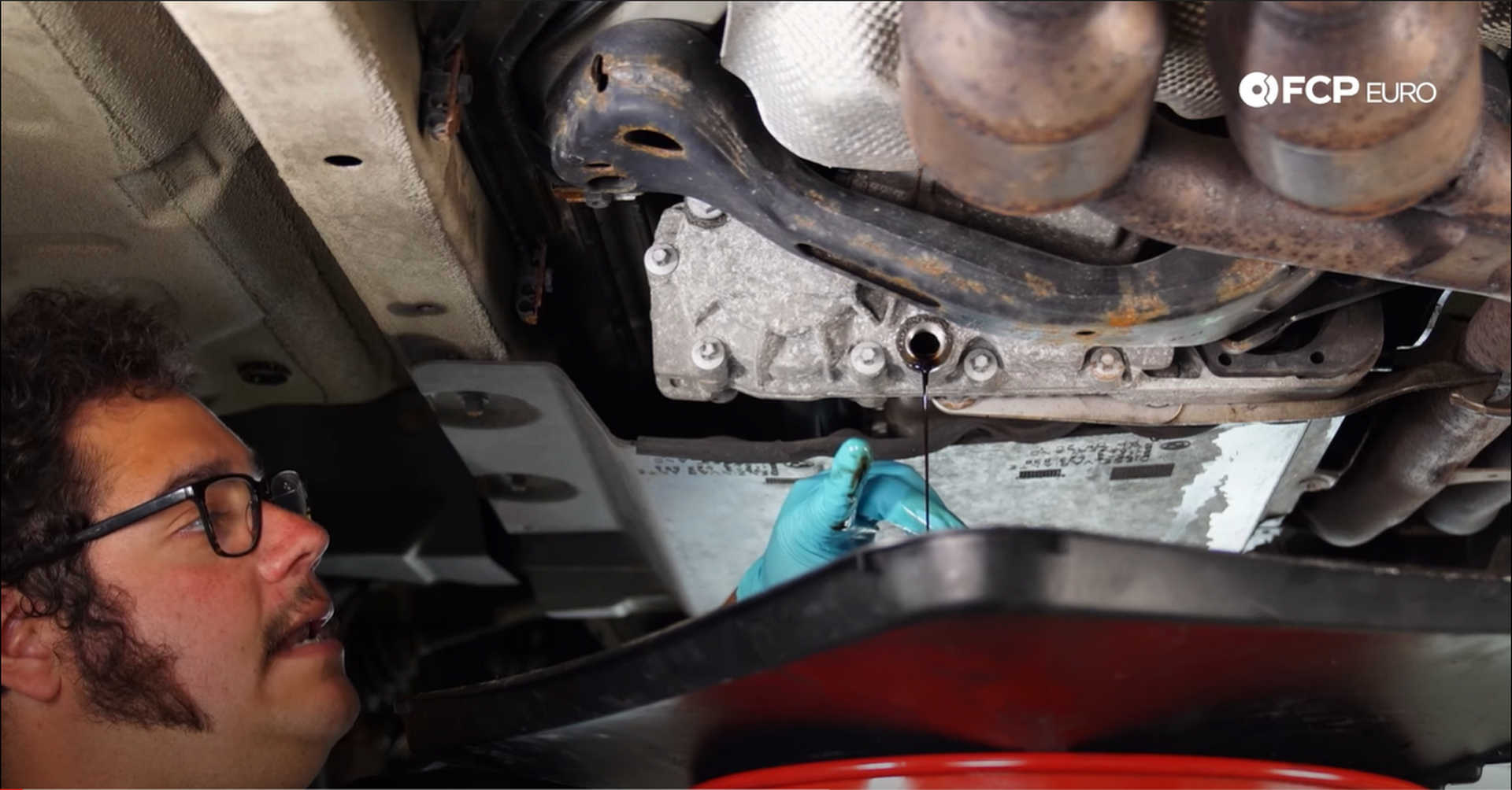 DIY BMW X3 Transfer Case Actuator draining the transfer case fluid