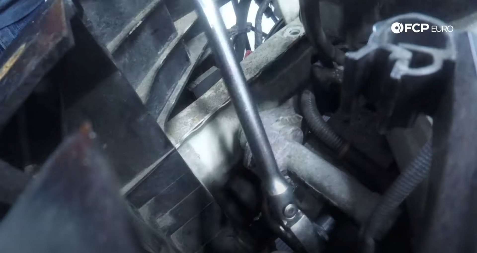 DIY MINI R56 Timing Chain Replacement removing the belt tensioner bolts