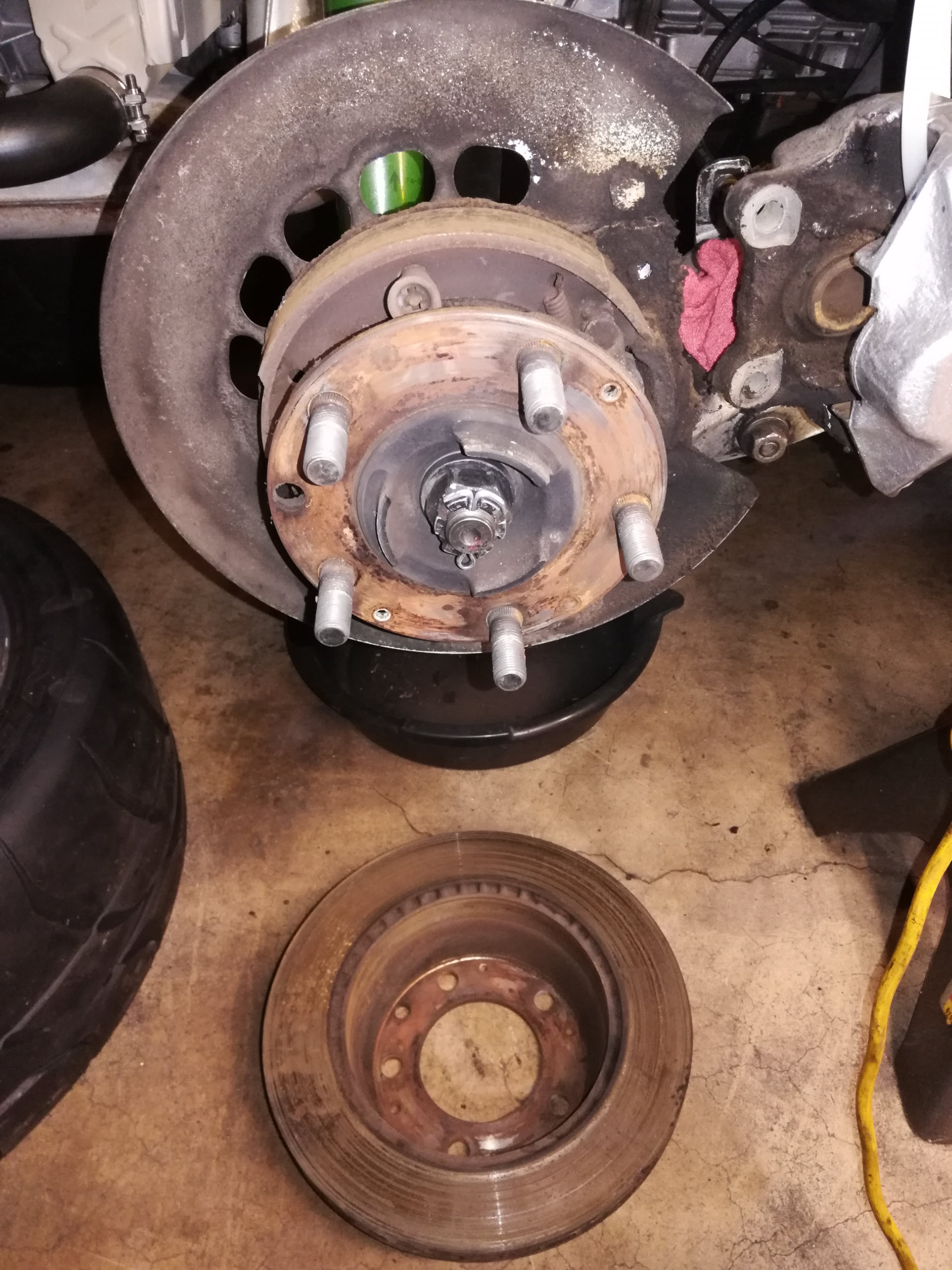 Air-cooled Porsche 911 rear brake rotor removal.