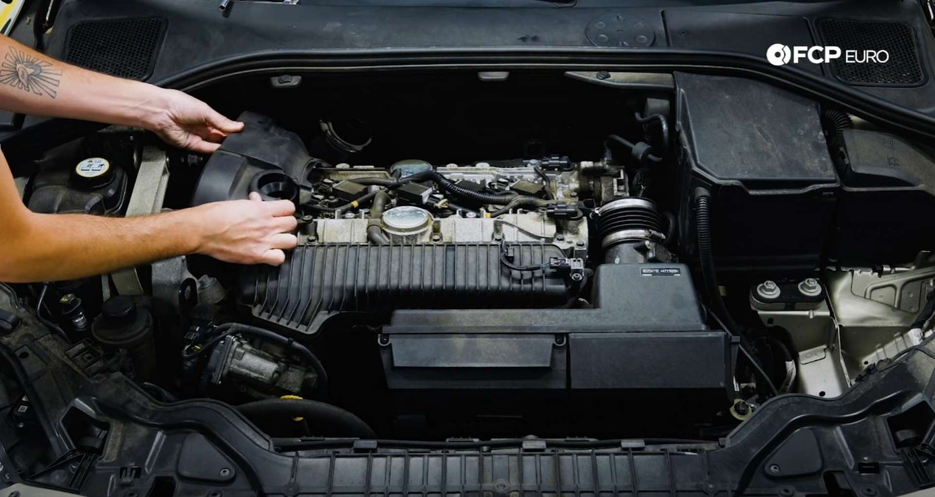 DIY Volvo Spark Plug and Ignition Coil Replacement removing the timing cover