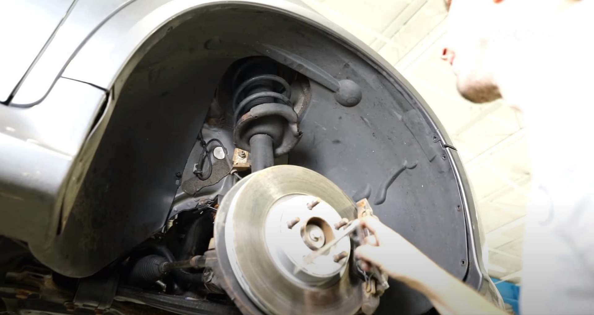 DIY Volvo P1 Timing Belt Replacement refitting the fender liner
