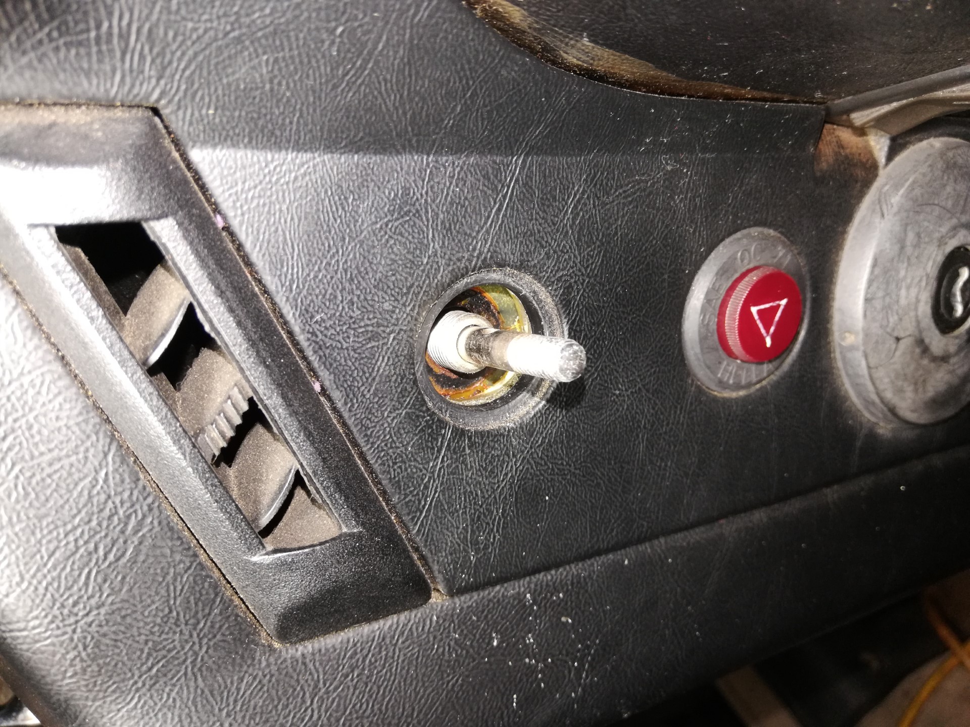 Air-cooled Porsche 911 headlight switch removal.