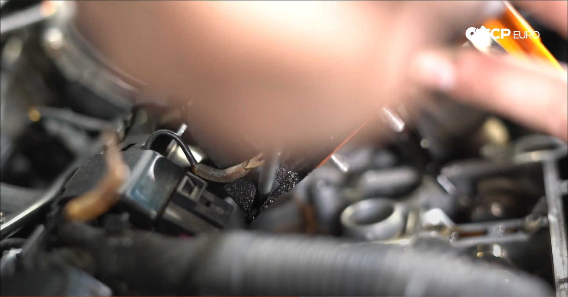 DIY VW GTI PCV Replacement opening the turbocharger line’s clip