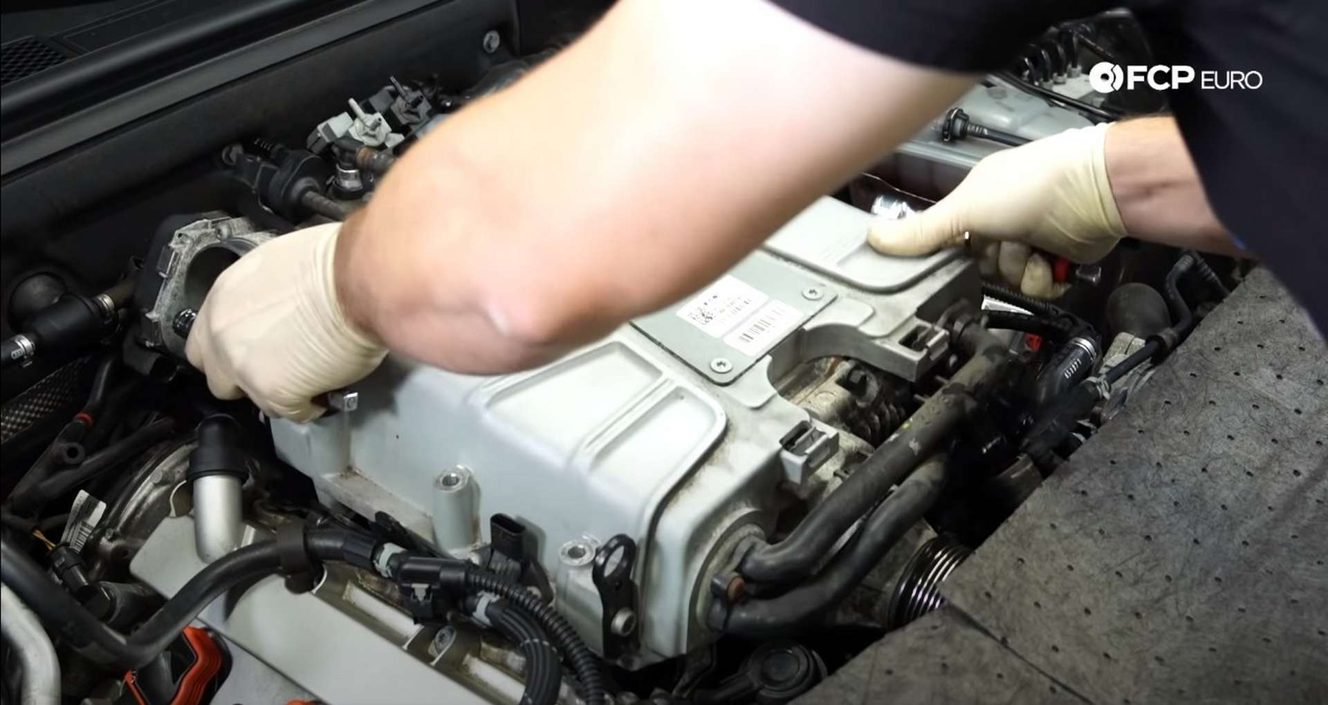 DIY Audi 3.0T Supercharger Oil Change removing the supercharger