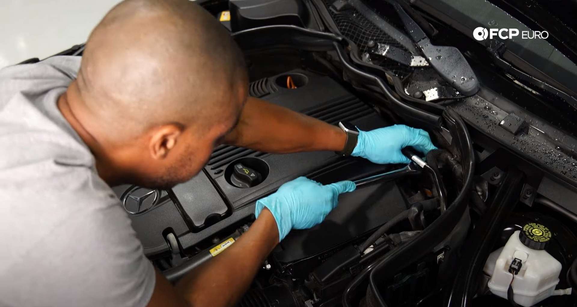 DIY Mercedes M271 Oil Change Loosening the oil filter housing cap