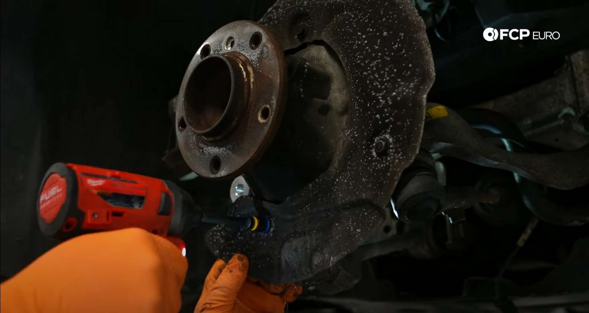 DIY BMW E90 Steering Knuckle Replacement caliper removing the dust shield