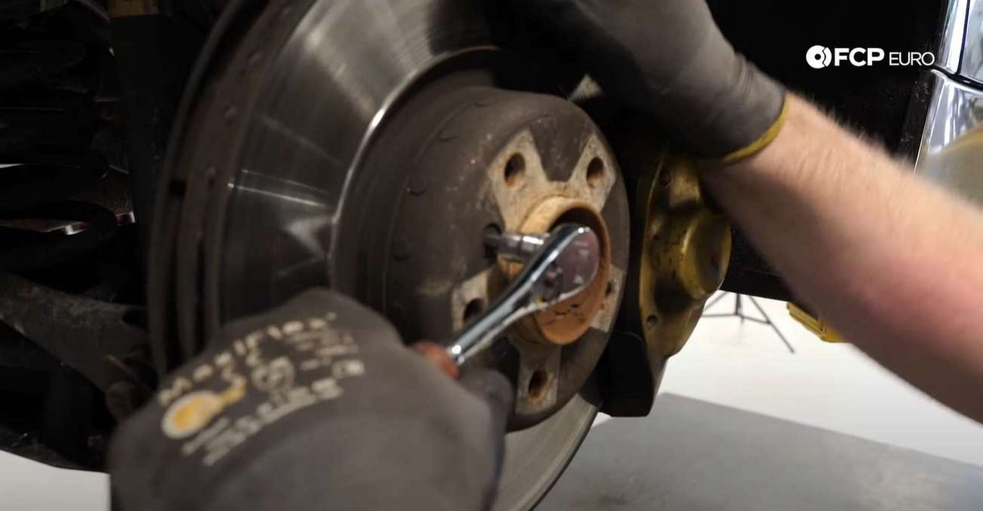 DIY BMW F30 M-Sport Rear Brake Service removing the set screw