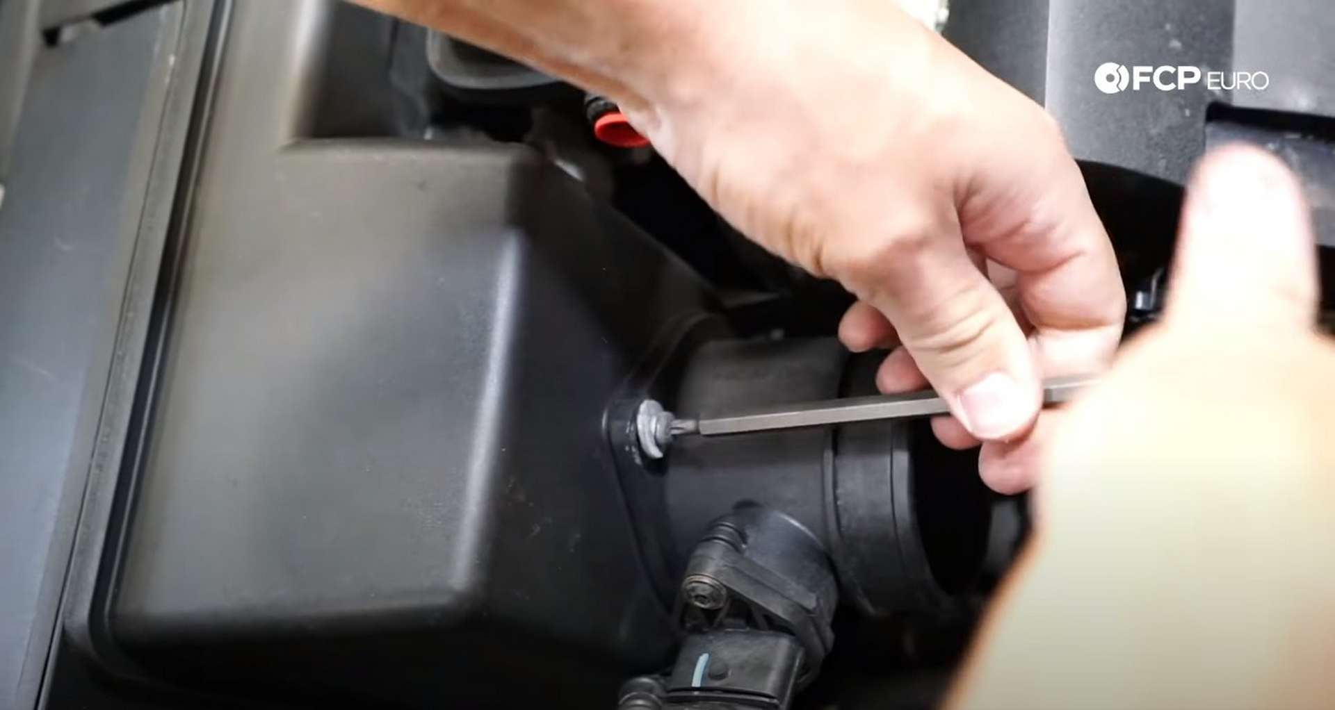 DIY Volvo P1 Timing Belt Replacement removing the mass airflow sensor housing