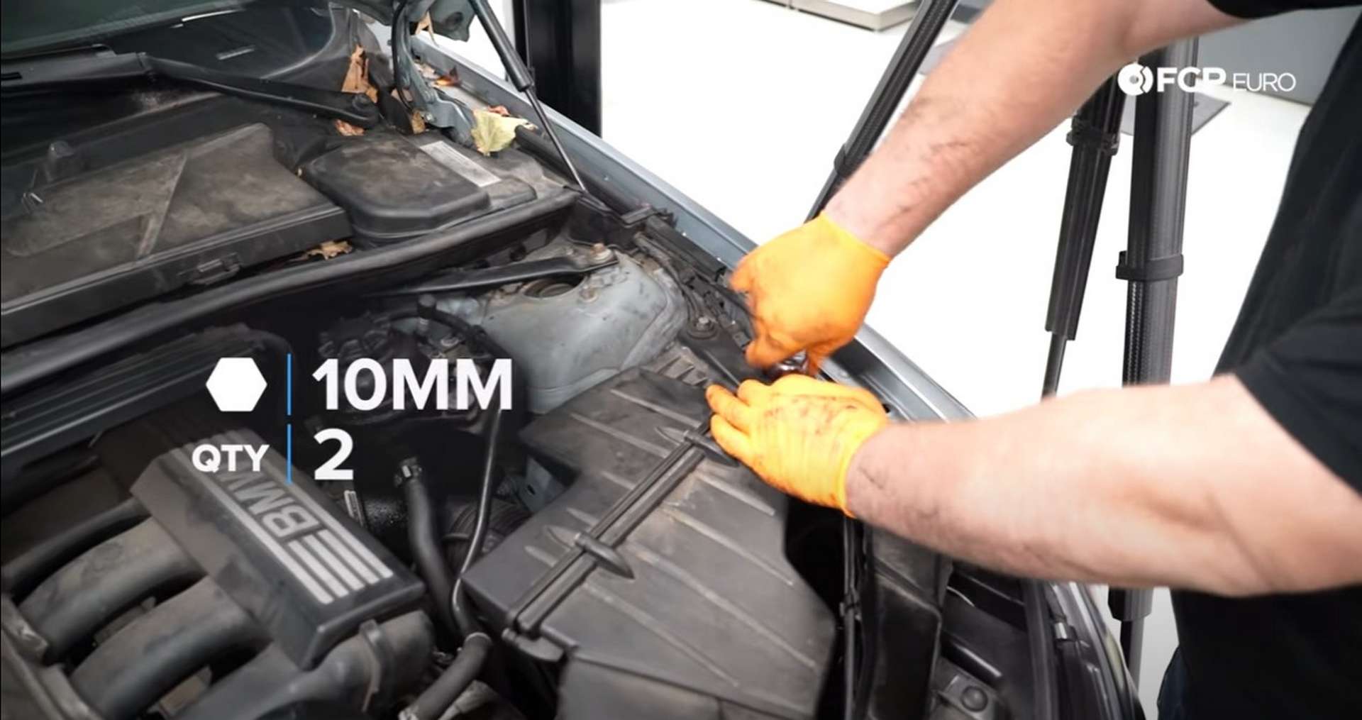 DIY BMW N52 Drive Belt Replacement tightening the airbox's mounting bolts