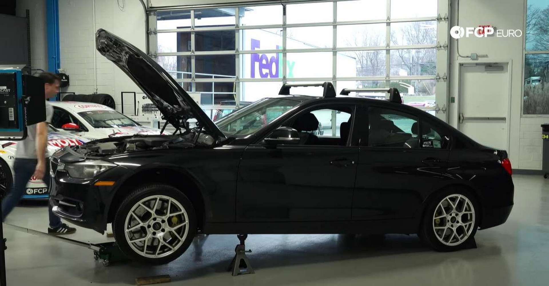 DIY BMW F30 Oil Change jacking up the front of the vehicle