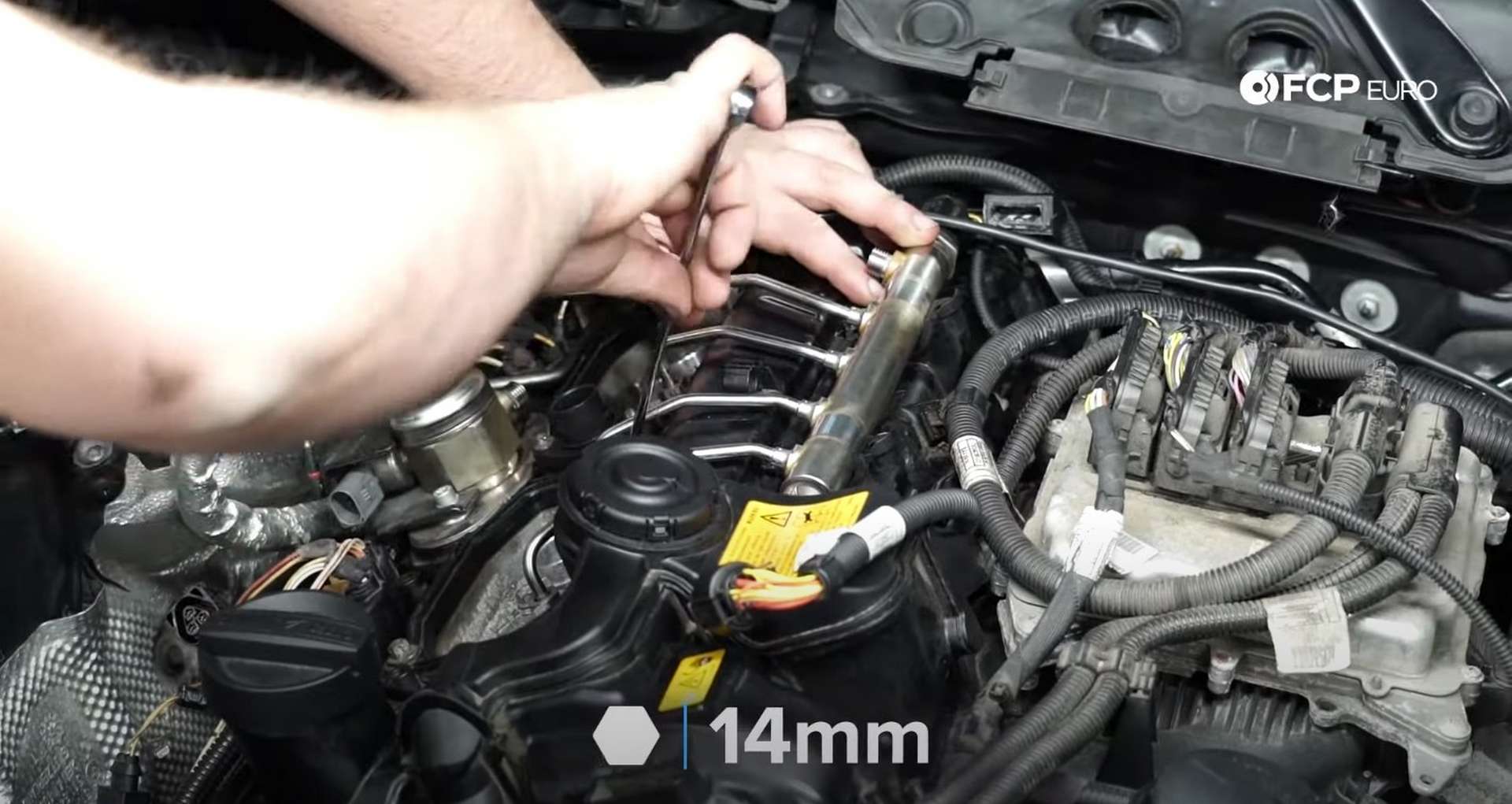 DIY BMW F30 Fuel Injector Replacement tightening the fuel injector connections