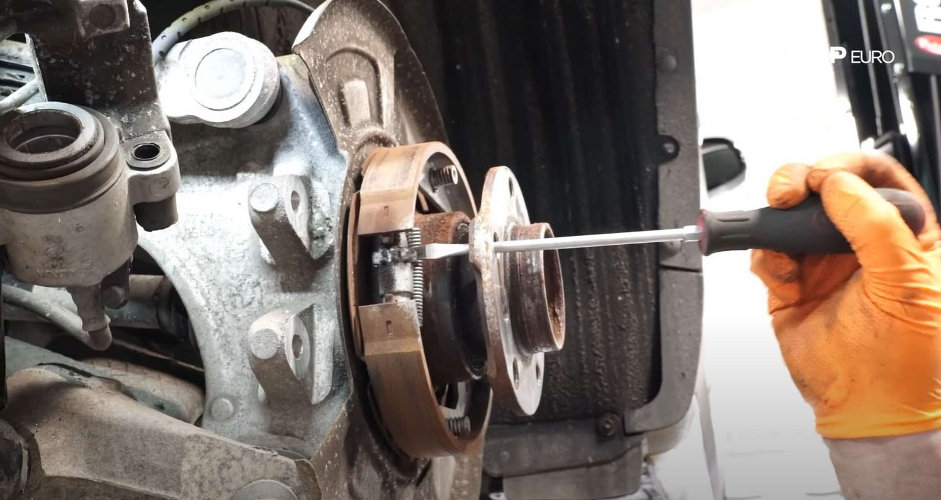 DIY BMW F15 X5 F16 X6 Brake Service adjusting the parking brake shoe