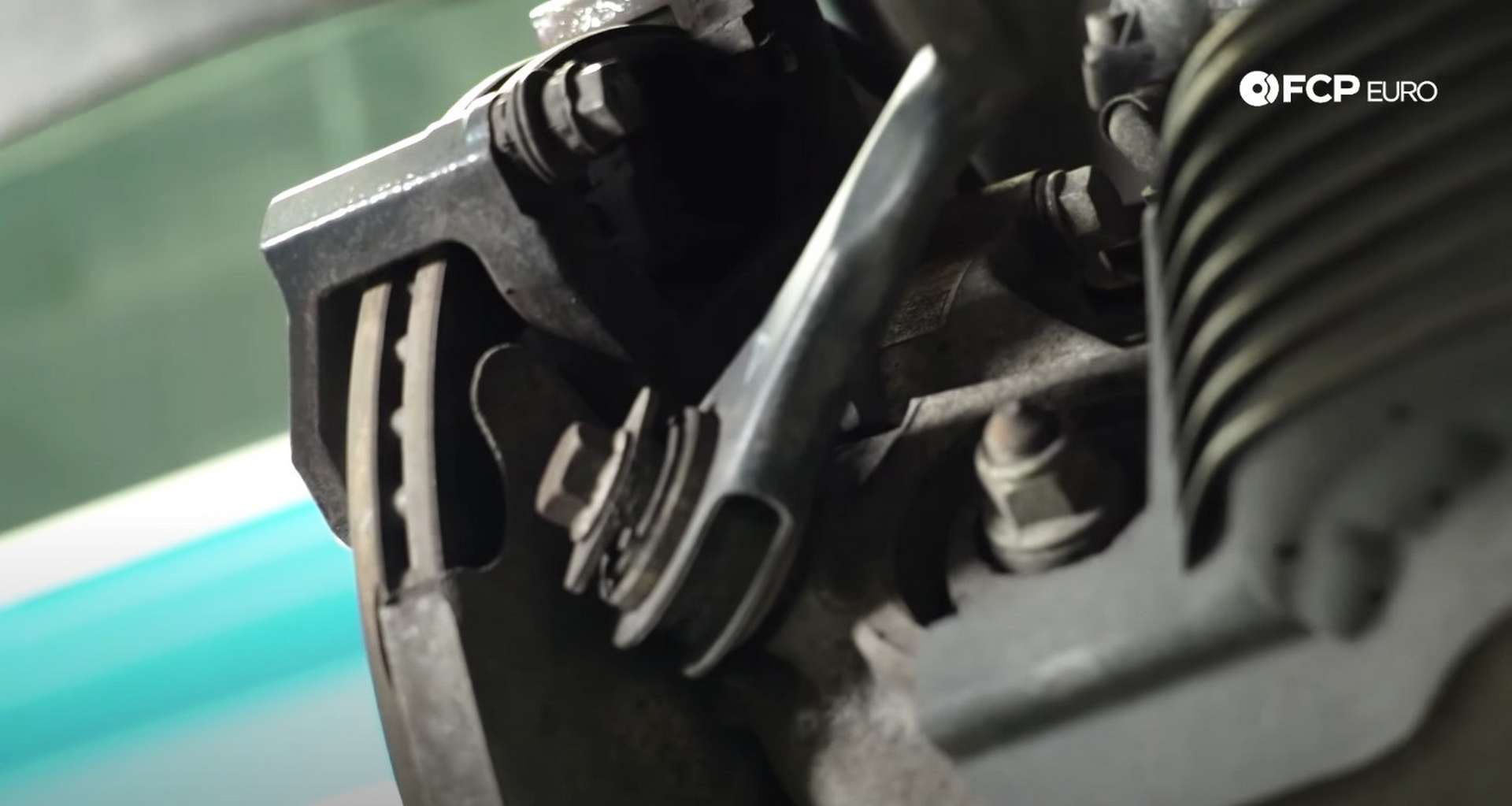 DIY Audi B8 S4 Rear Brake Service caliper bracket bolt location