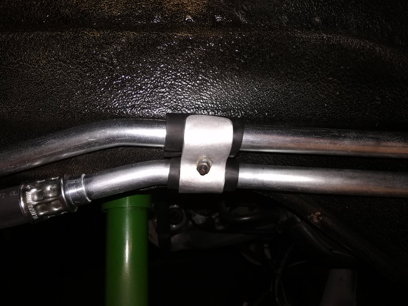 Porsche 911 rear oil cooler lines retaining clamp.
