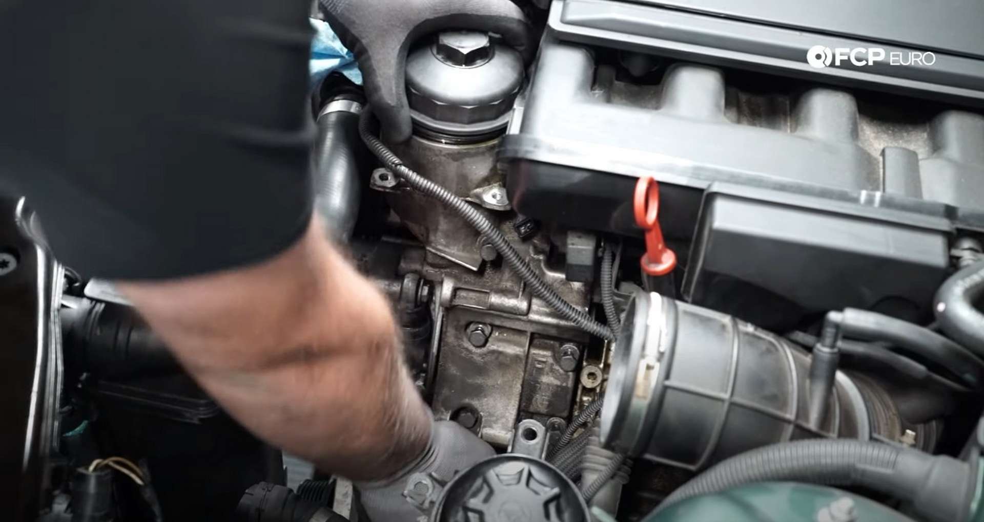DIY BMW E46 Oil Filter Housing Gasket and VANOS Line Replacement oil filter housing bolt locations