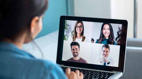 woman joining her online group classes from home