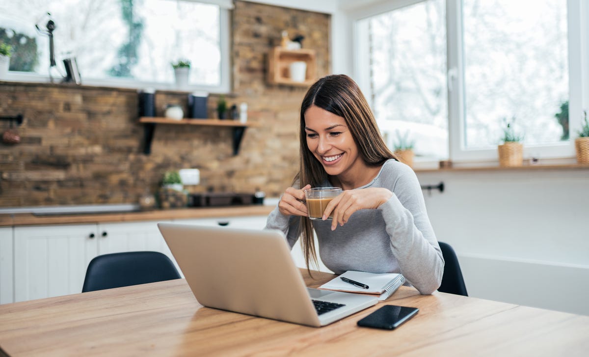 woman learning french online from home