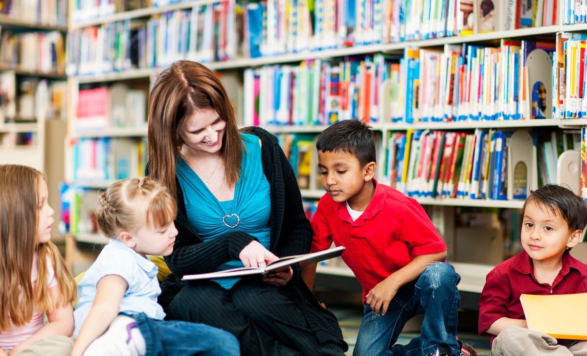 instructor teaching language for kids