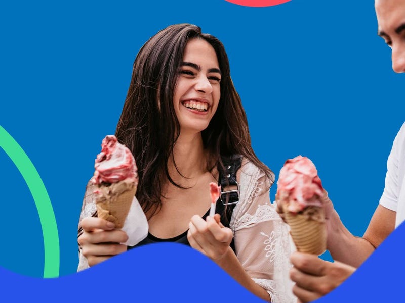 Woman saying thank you for the ice cream to her friend