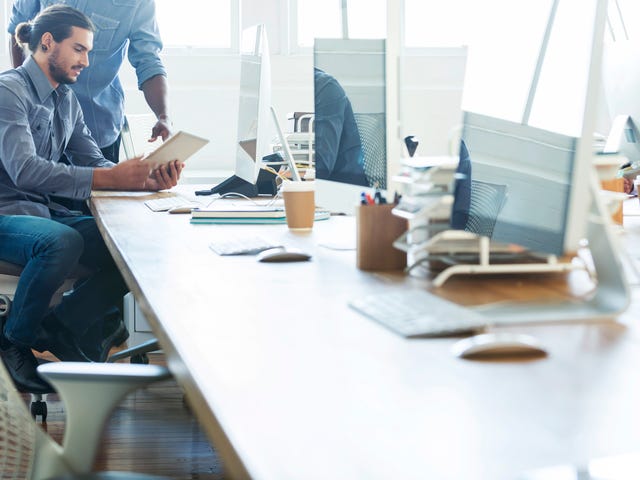 students learning about business services at the language center