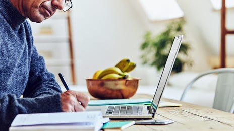 man learning italian online from home