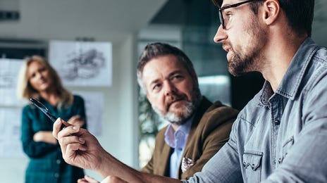business colleagues taking a language training at work