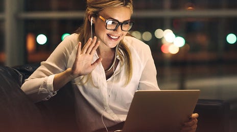woman joining an online private class on her laptop