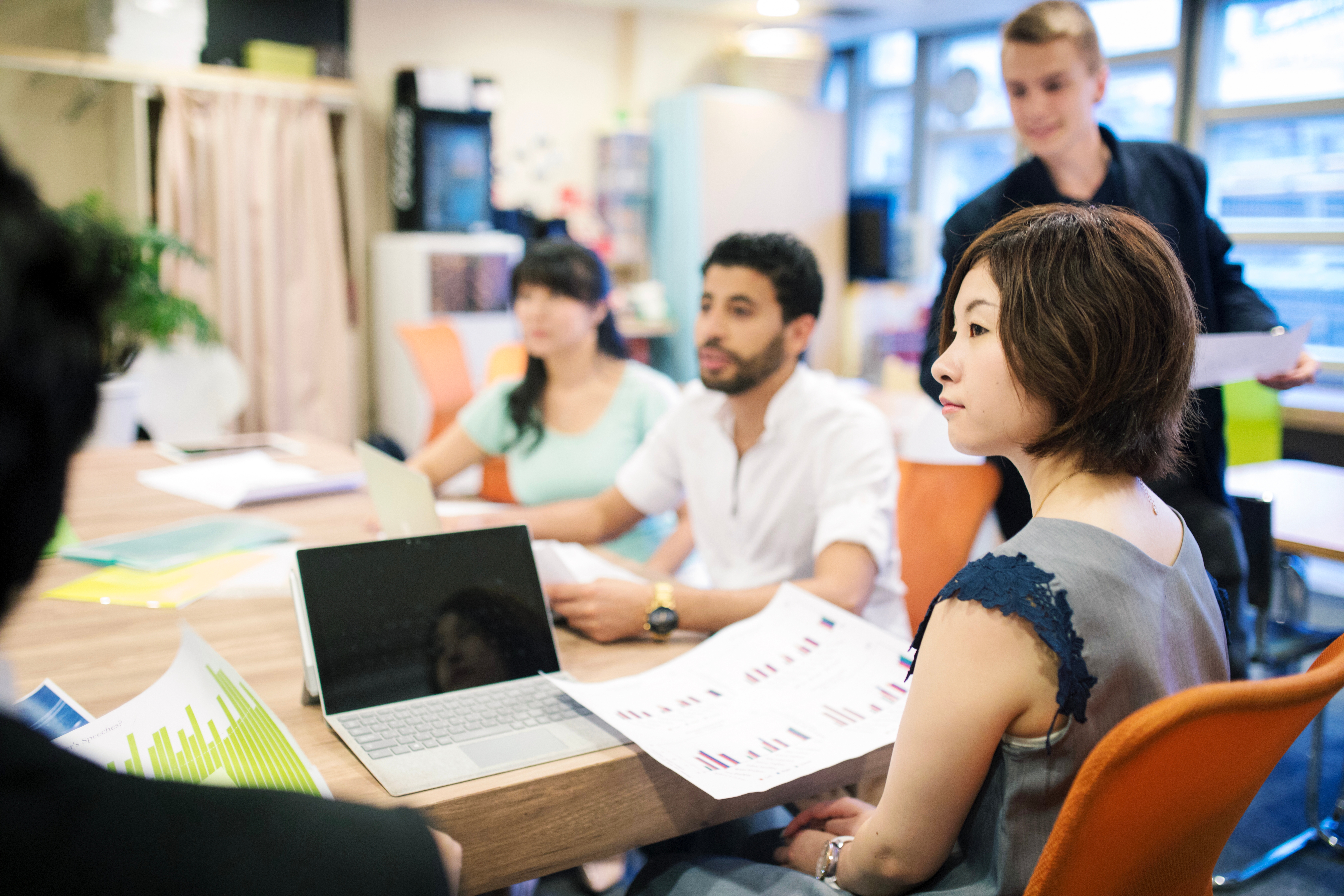woman learning japanese with her peers