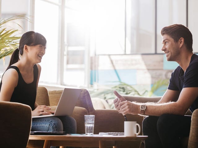 man and woman learning a language together