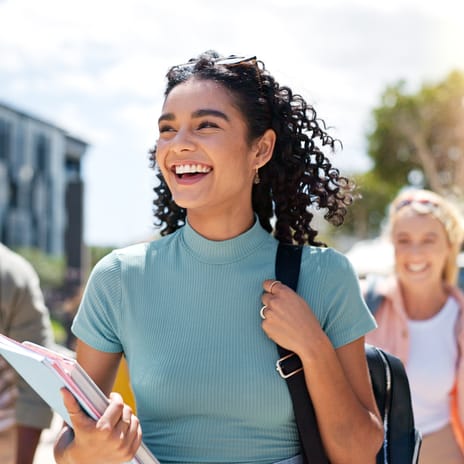 Girl smiling while on her way to her private language tutoring for kids and teens with Berlitz Canada