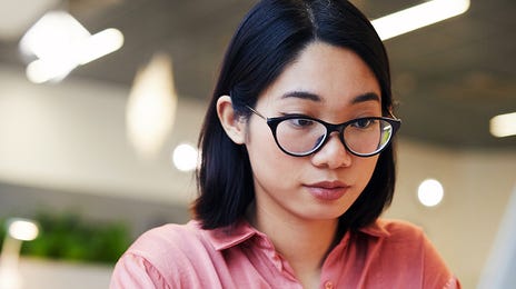 woman learning japanese online on her computer